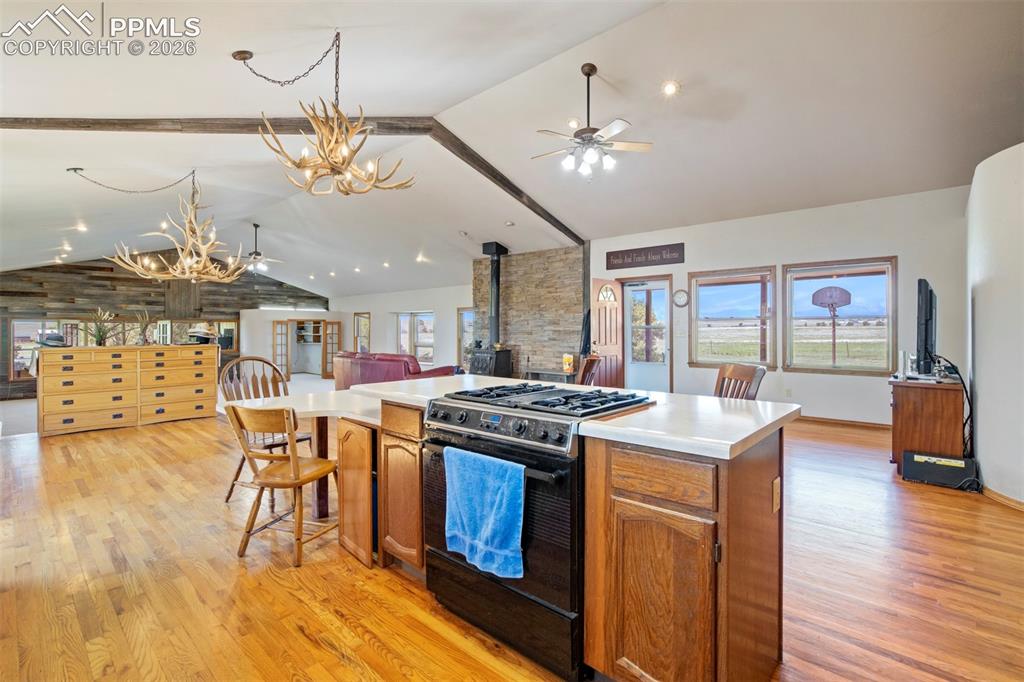 2550 Slocum Road Peyton, CO 80831 - Photo 28 of 50 a kitchen that has a stove and a table