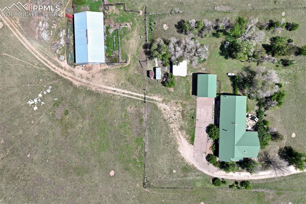 2550 Slocum Road Peyton, CO 80831 - Photo 3 of 50 a view of a garden