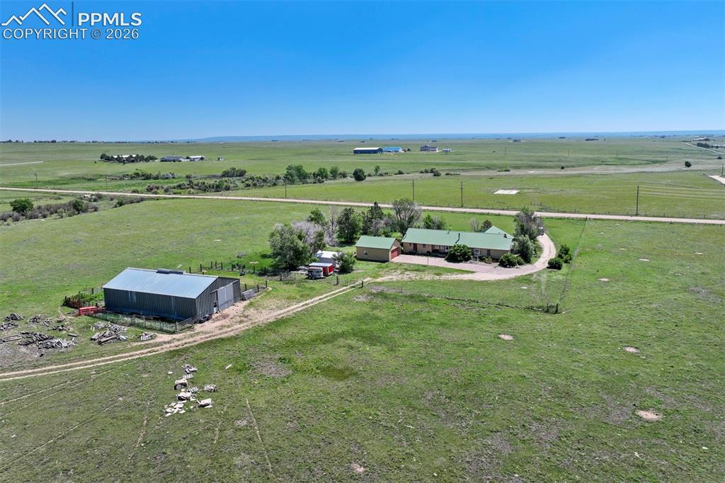 2550 Slocum Road Peyton, CO 80831 - Photo 4 of 50 a view of a lake with a yard
