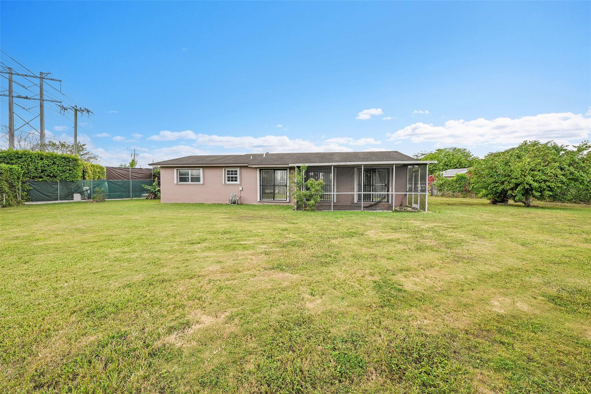 13615 Southwest 72nd Terrace Miami, FL 33183 - Photo 20 of 27 a view of building with yard