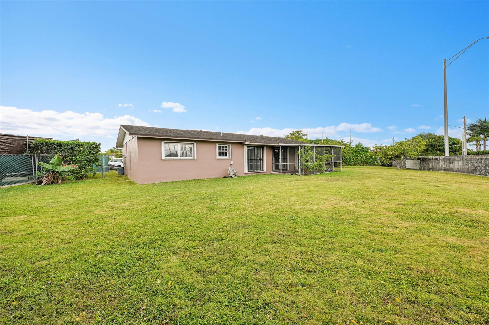 13615 Southwest 72nd Terrace Miami, FL 33183 - Photo 24 of 27 a view of a big room with an outdoor space and seating area