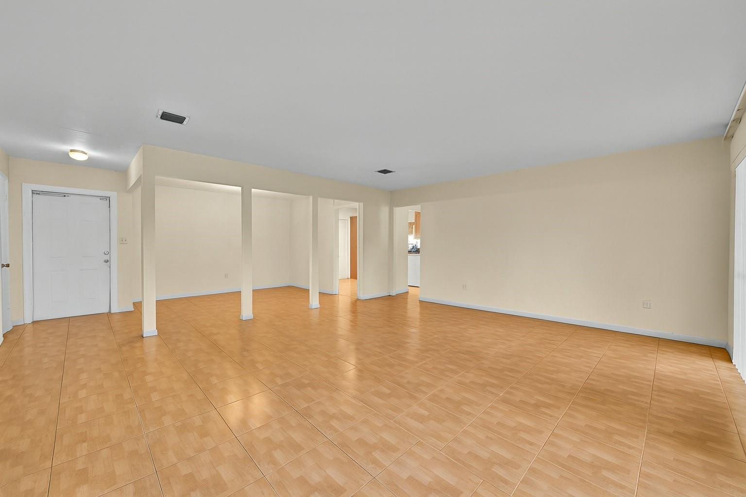 13615 Southwest 72nd Terrace Miami, FL 33183 - Photo 3 of 27 a view of an empty room with wooden floor