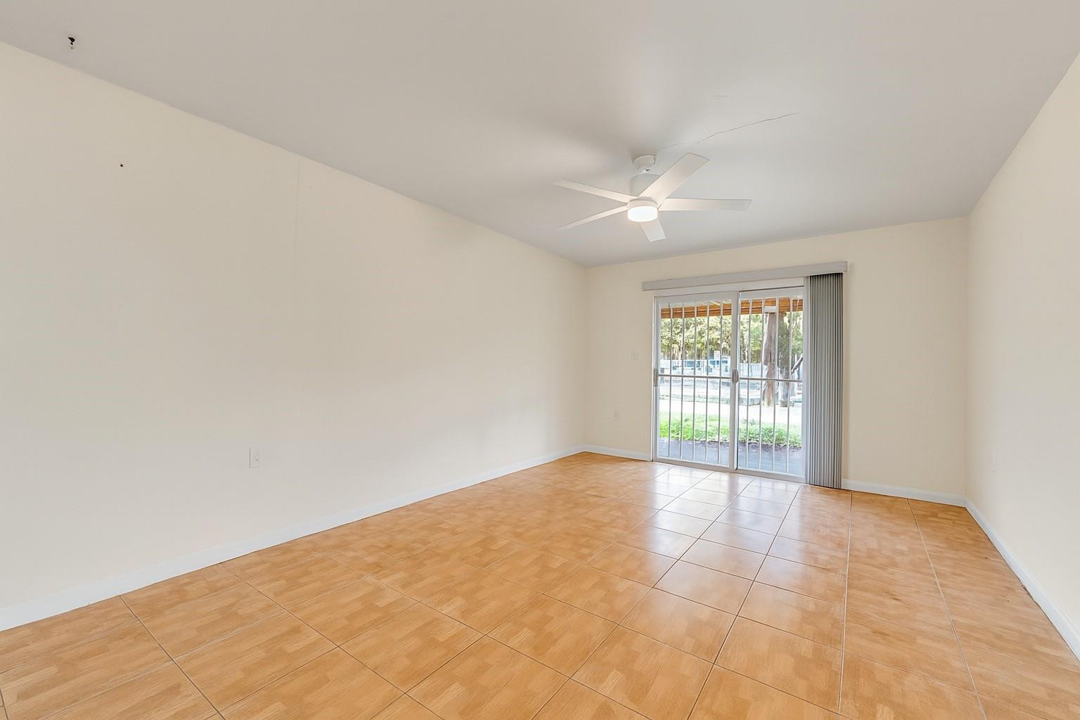 13615 Southwest 72nd Terrace Miami, FL 33183 - Photo 6 of 27 a view of an empty room with a window