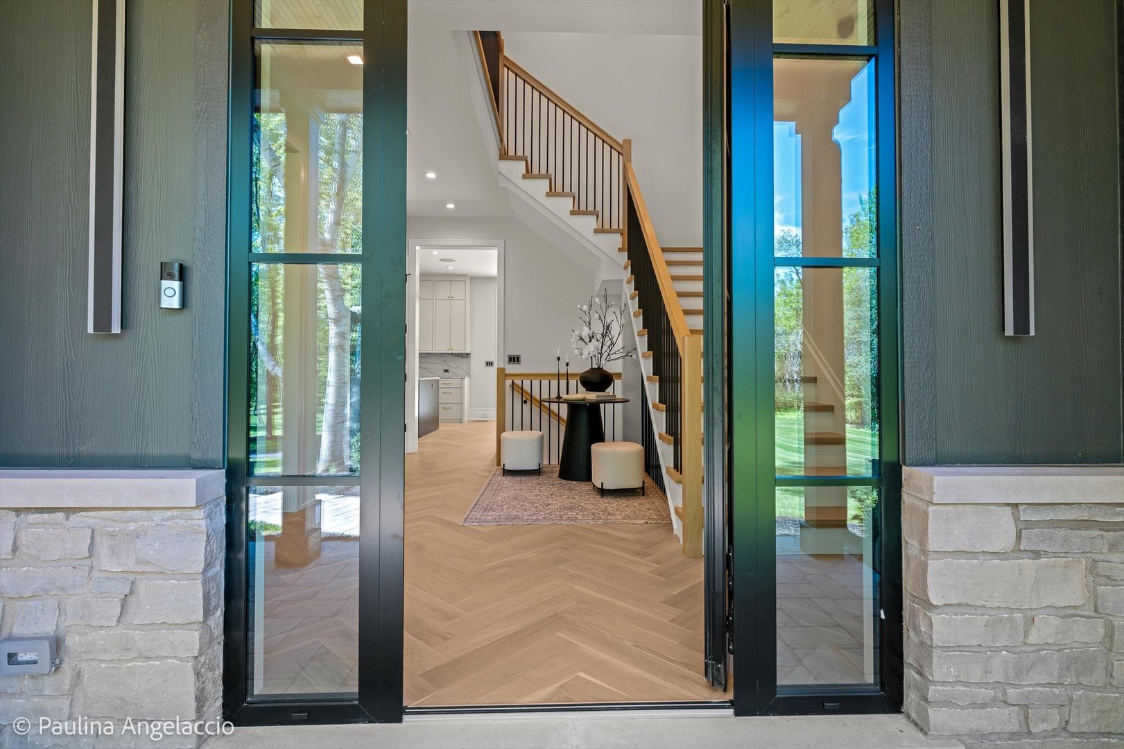 699 Plum Tree Road Barrington Hills, IL 60010 - Photo 10 of 84 a view of a hallway with wooden floor and staircase