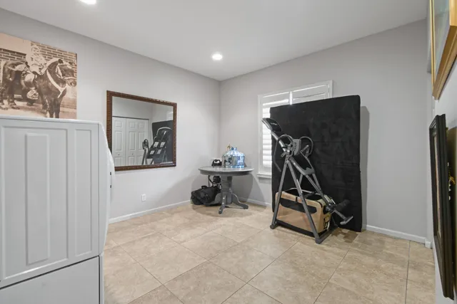 a bed room with a bed and a window