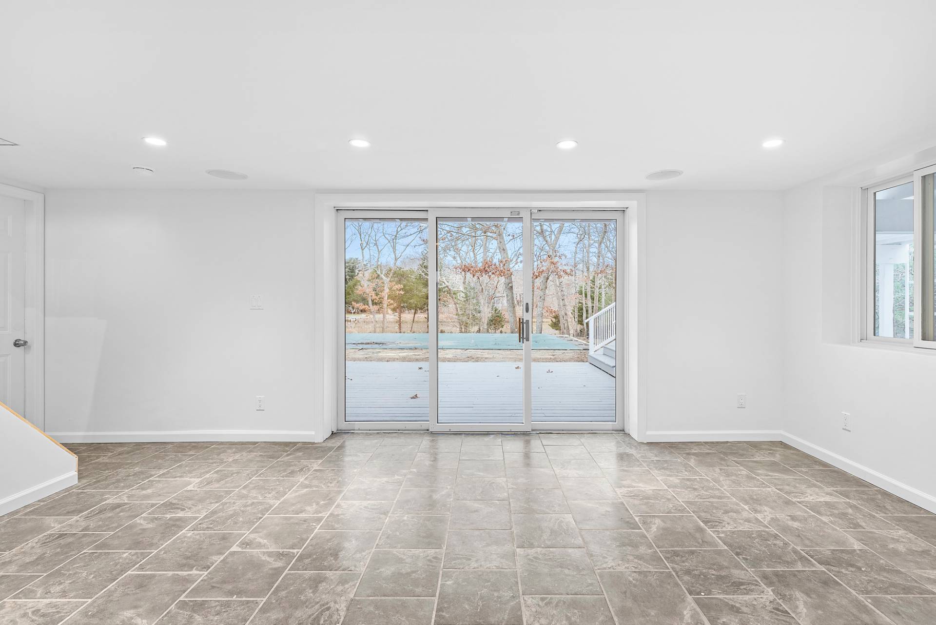 34 Fenmarsh Road East Hampton, NY 11937 - Photo 11 of 16 a view of an empty room with a window