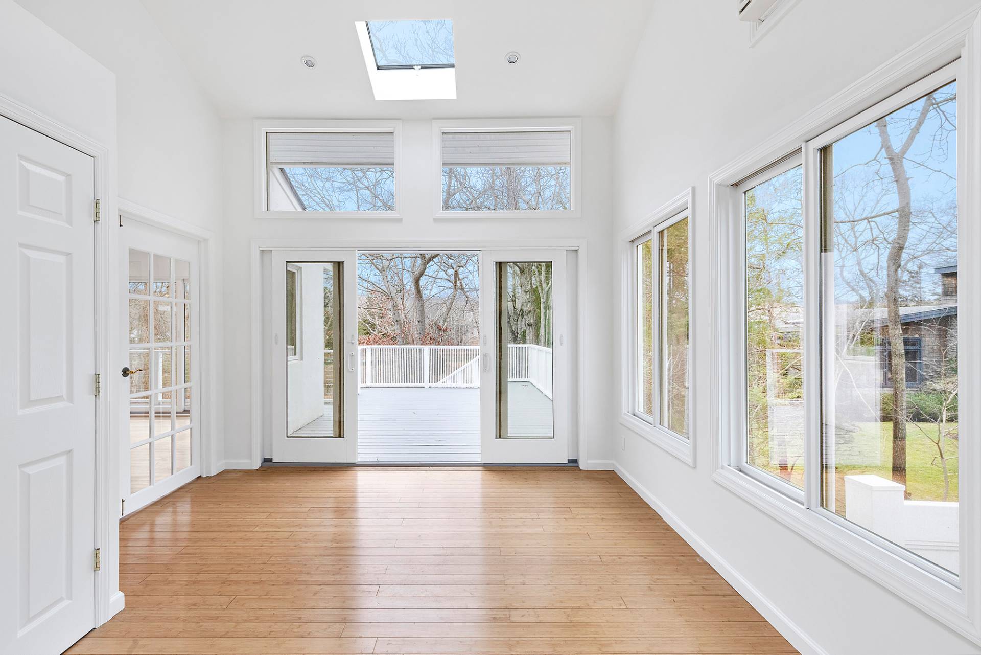 34 Fenmarsh Road East Hampton, NY 11937 - Photo 8 of 16 a view of an entryway with wooden floor and windows