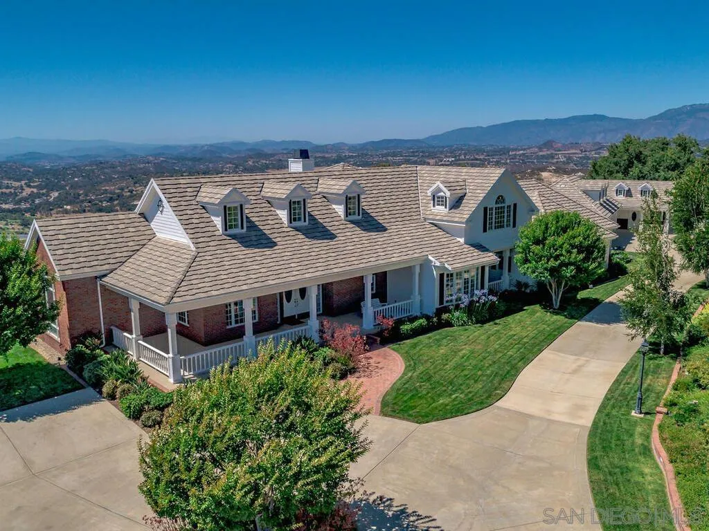 14490 Ridge Ranch Road Escondido, CA 92027 - Photo 1 of 74 an aerial view of a house with a garden and plants