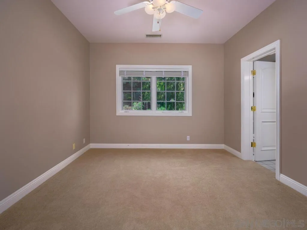 14490 Ridge Ranch Road Escondido, CA 92027 - Photo 24 of 74 an empty room with a window