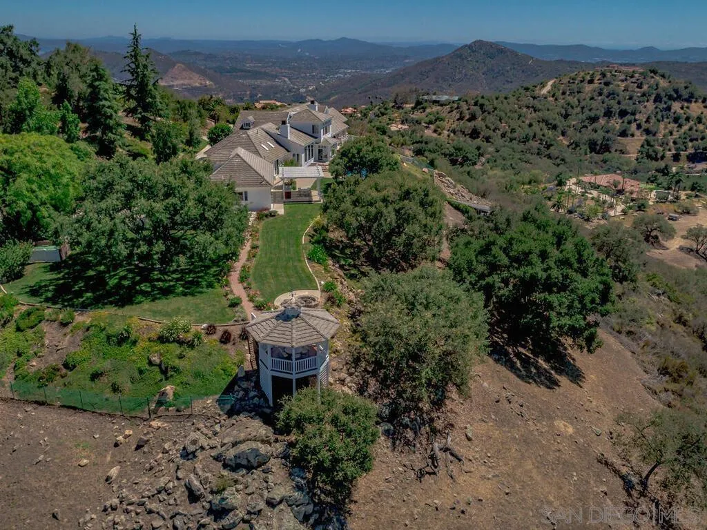 14490 Ridge Ranch Road Escondido, CA 92027 - Photo 4 of 74 an aerial view of a house with a yard