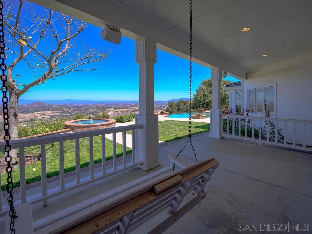 14490 Ridge Ranch Road Escondido, CA 92027 - Photo 41 of 74 a bench sitting in front of a building