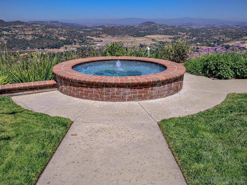 14490 Ridge Ranch Road Escondido, CA 92027 - Photo 46 of 74 an aerial view of a house with a yard and outdoor seating