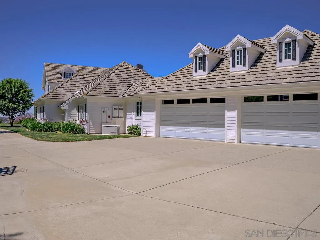 14490 Ridge Ranch Road Escondido, CA 92027 - Photo 64 of 74 a front view of a house with a yard