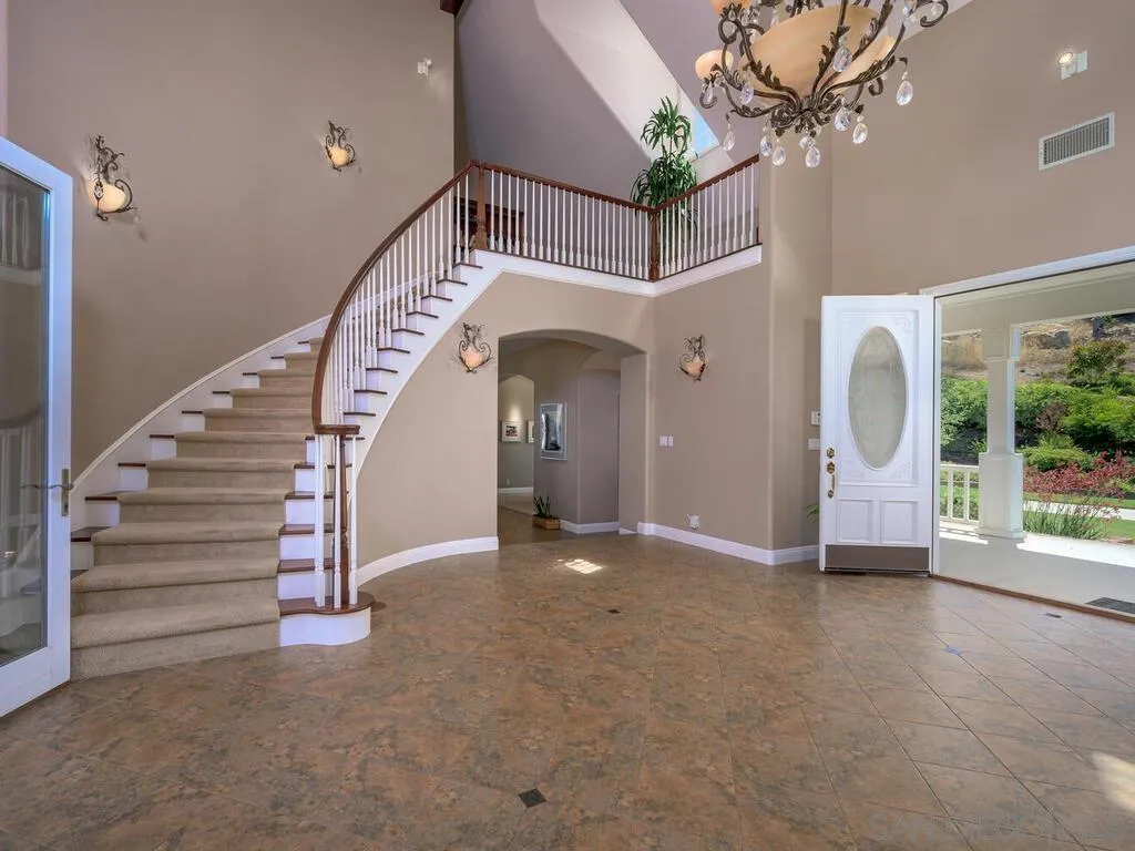 14490 Ridge Ranch Road Escondido, CA 92027 - Photo 10 of 74 a view of a hallway with staircase