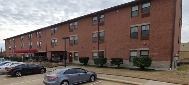 a car parked in front of a building