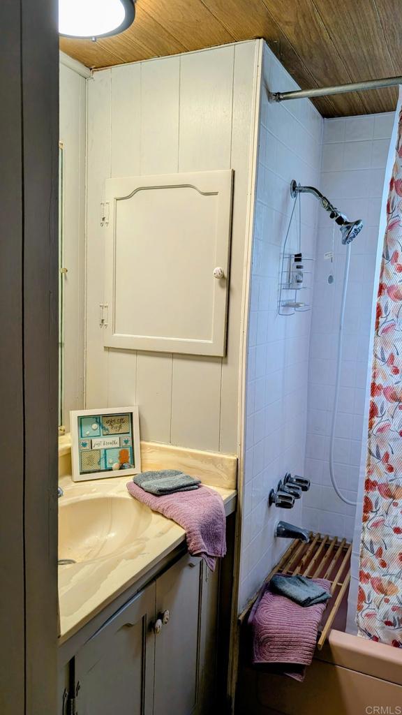 9459 Mission Gorge Road, Unit 68 Santee, CA 92071 - Photo 8 of 13 a bathroom with a sink and a mirror