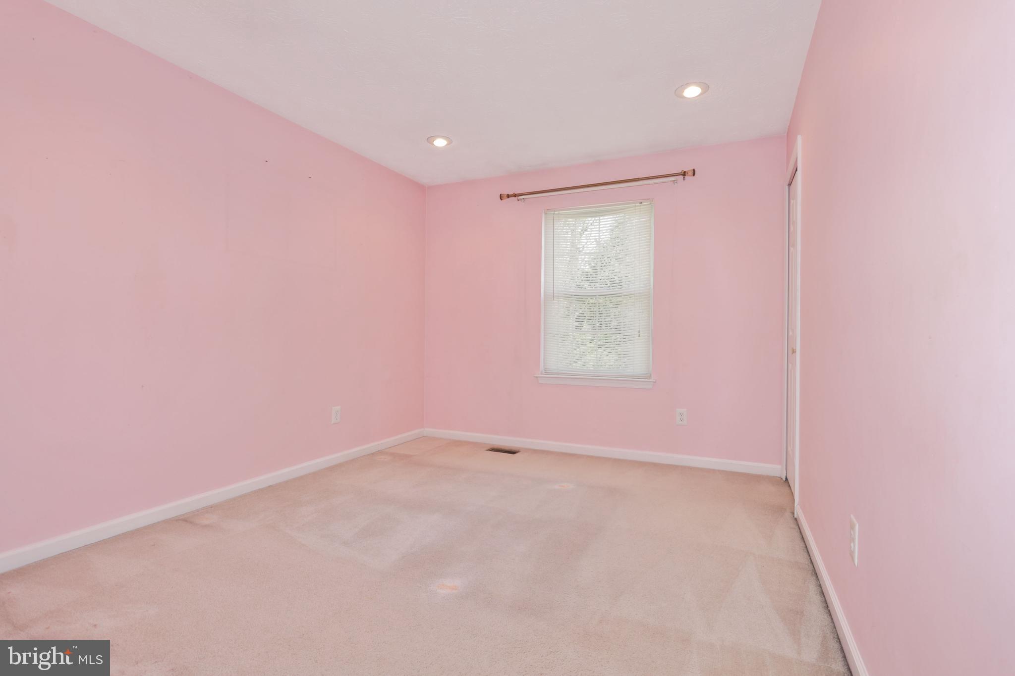 7643 Bear Forest Road Hanover, MD 21076 - Photo 19 of 23 an empty room with windows