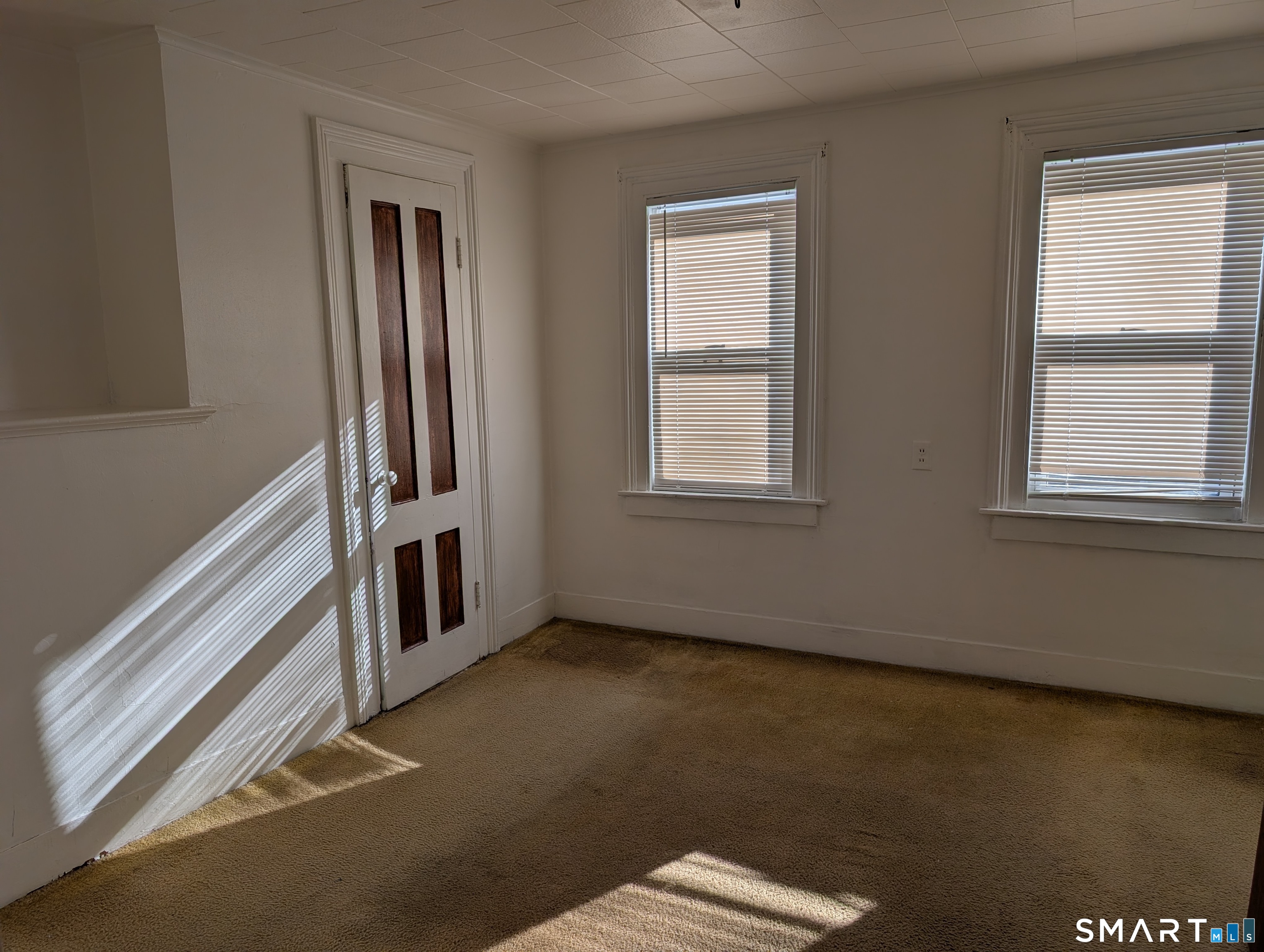 48 Anderson Street Naugatuck, CT 06770 - Photo 13 of 17 an empty room with a window