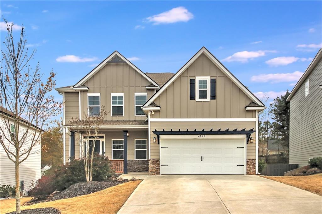 a front view of a house with yard