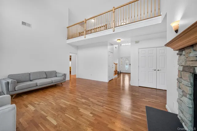 a view of walk in closet with clothes