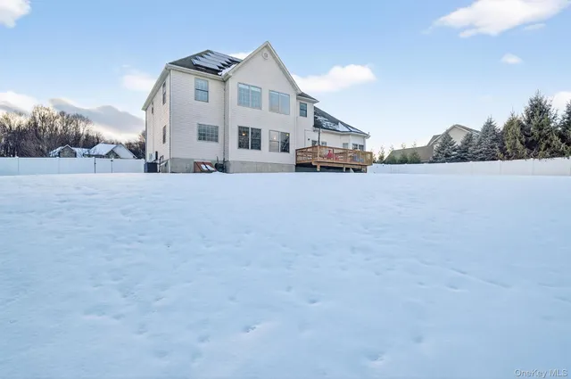a view of garage and yard