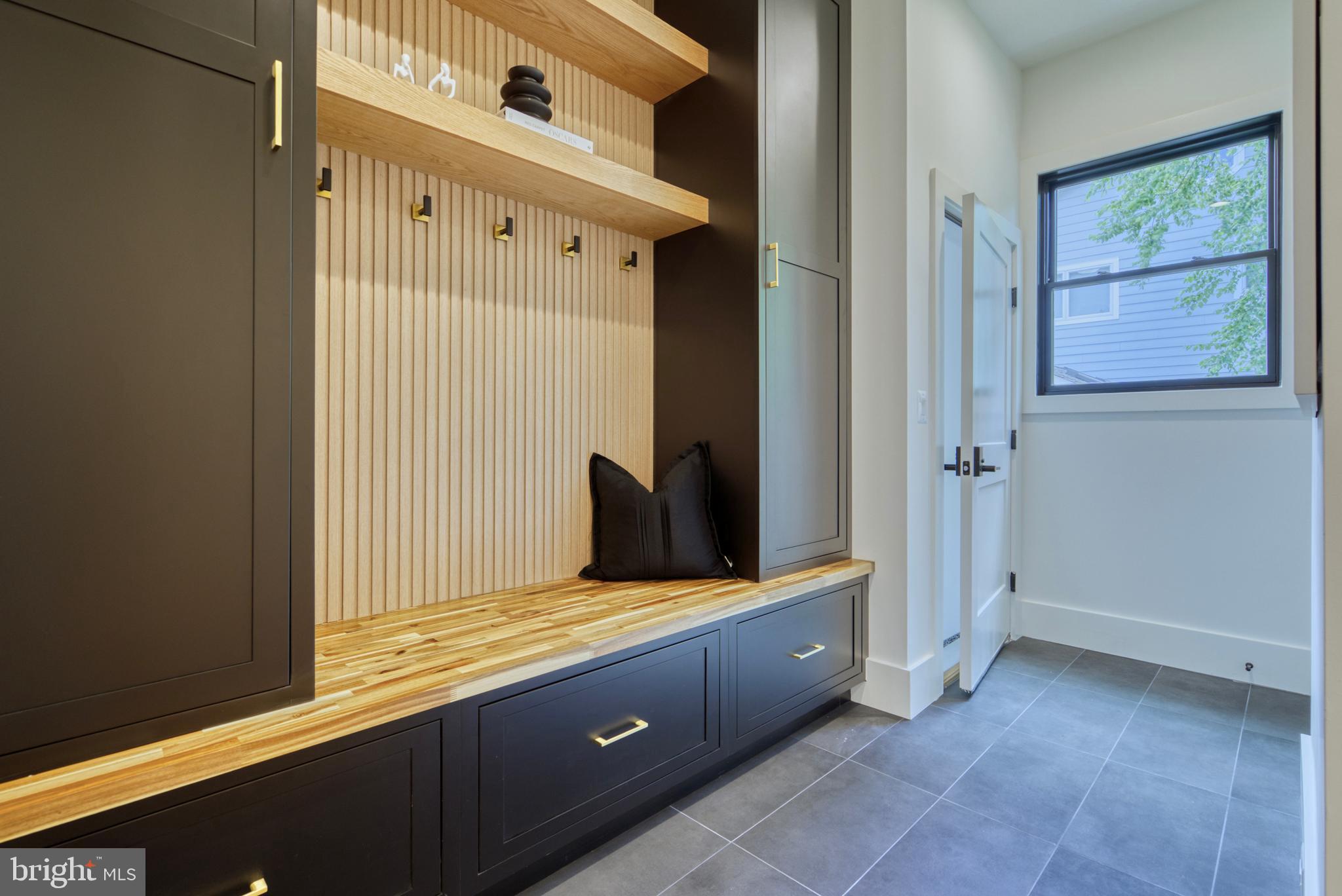 1828 Opalocka Drive McLean, VA 22101 - Photo 28 of 75 Mudroom with built-in bench and coat rack