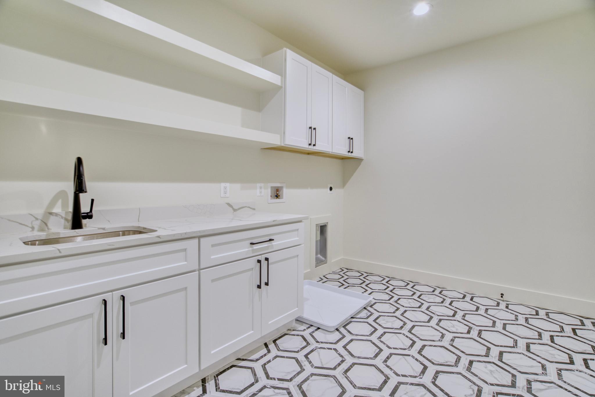 1828 Opalocka Drive McLean, VA 22101 - Photo 50 of 75 laundry room w/ Built in cabinetry and sink
