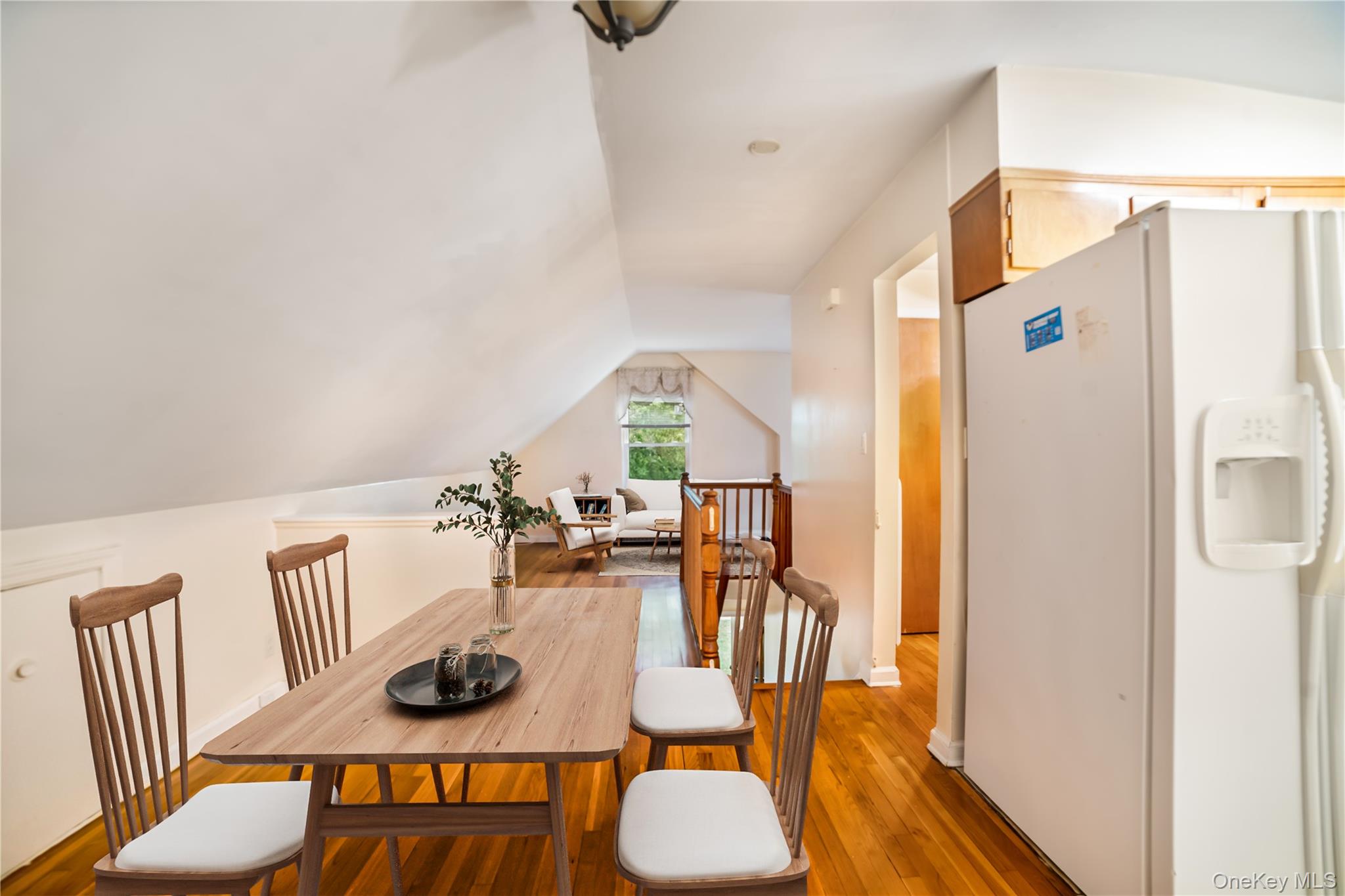 77-19 252nd Street Queens, NY 11426 - Photo 14 of 27 a view of a dining room with furniture window and wooden floor