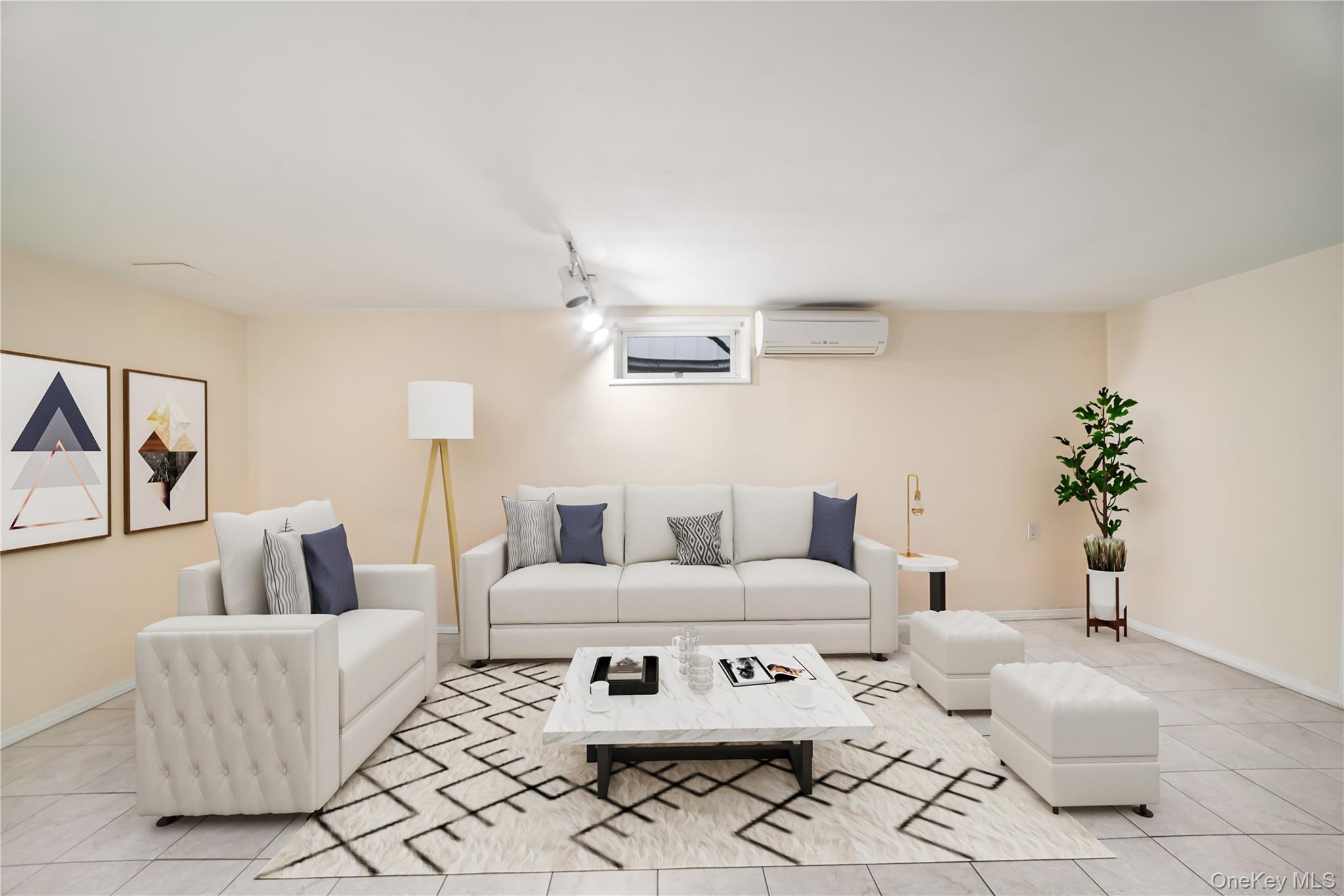 77-19 252nd Street Queens, NY 11426 - Photo 20 of 27 a living room with furniture and wooden floor