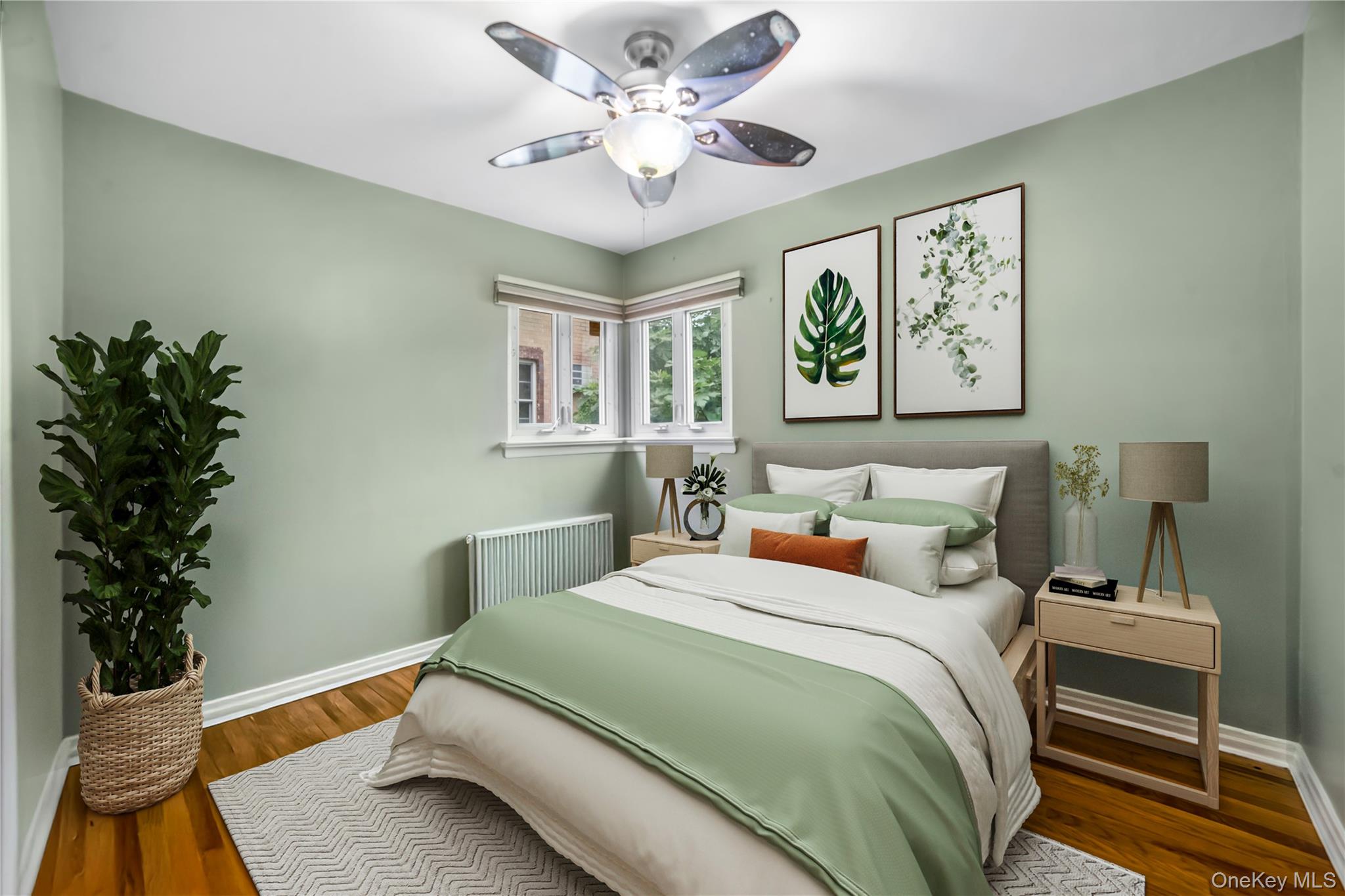 77-19 252nd Street Queens, NY 11426 - Photo 8 of 27 a bedroom with a bed and a chandelier