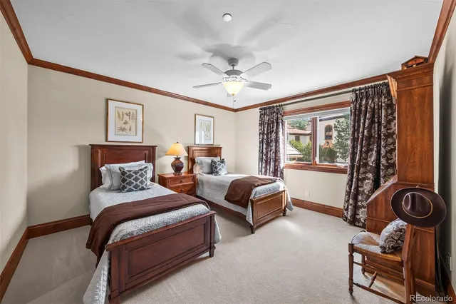 a bathroom with a double vanity sink and mirror