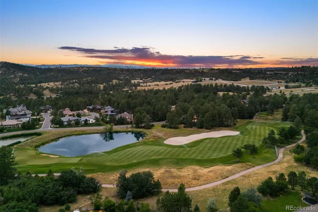 a view of a town with mountains in the background