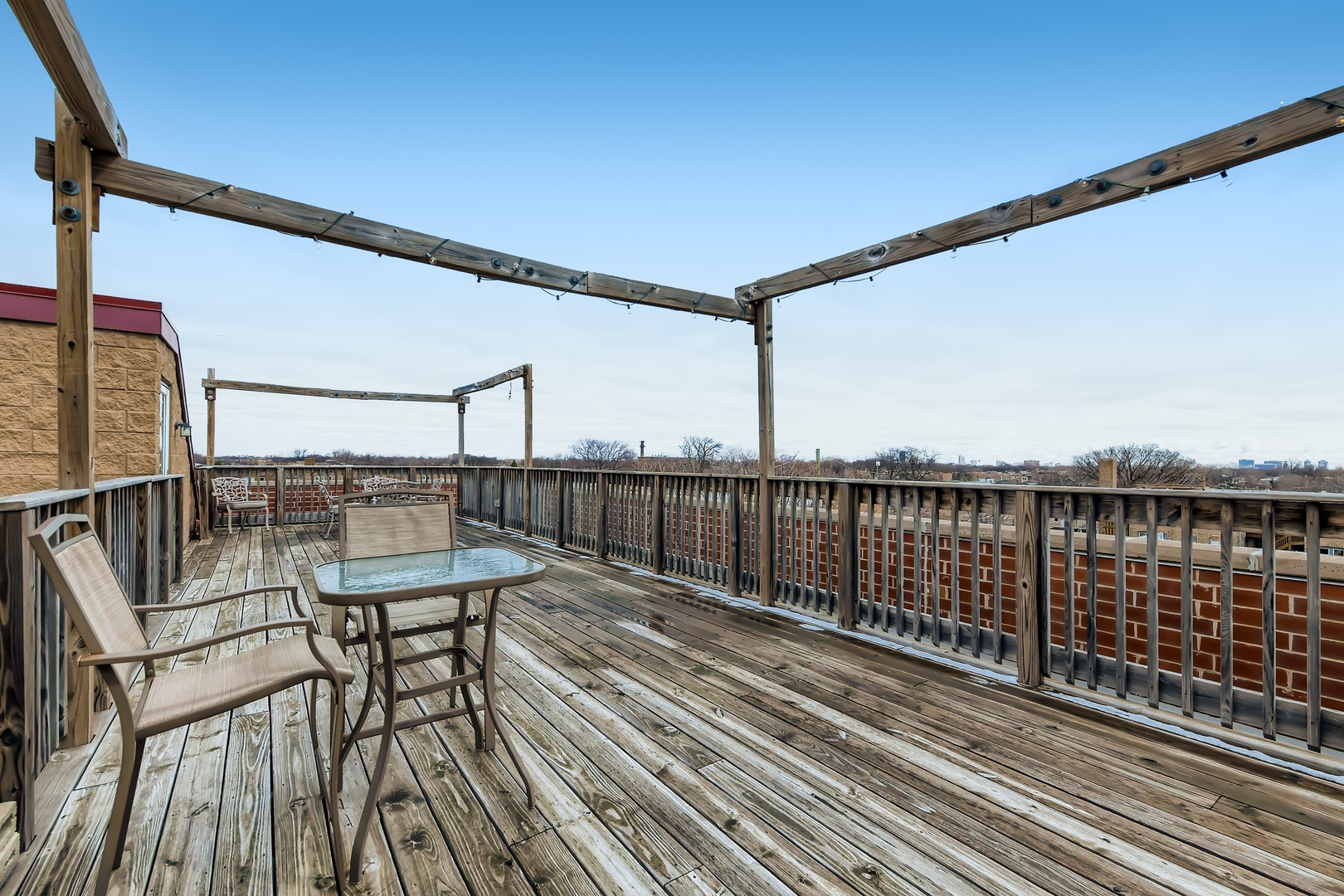 3114 West Irving Park Road, Unit 4E Chicago, IL 60618 - Photo 15 of 18 a view of balcony with furniture