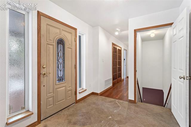 9860 Hardy Road Colorado Springs, CO 80908 - Photo 2 of 6 Entry foyer