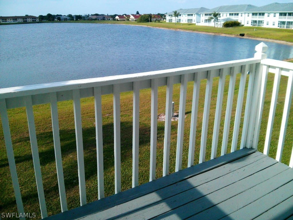 26310 Rampart Boulevard, Unit 505E Punta Gorda, FL 33983 - Photo 3 of 17 a view of a balcony with lake view