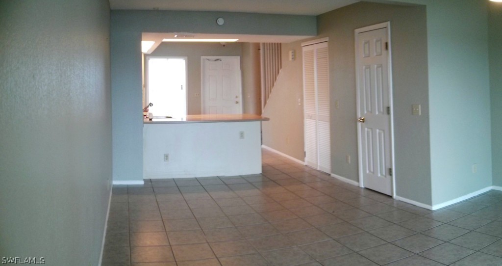 26310 Rampart Boulevard, Unit 505E Punta Gorda, FL 33983 - Photo 6 of 17 an empty room with window