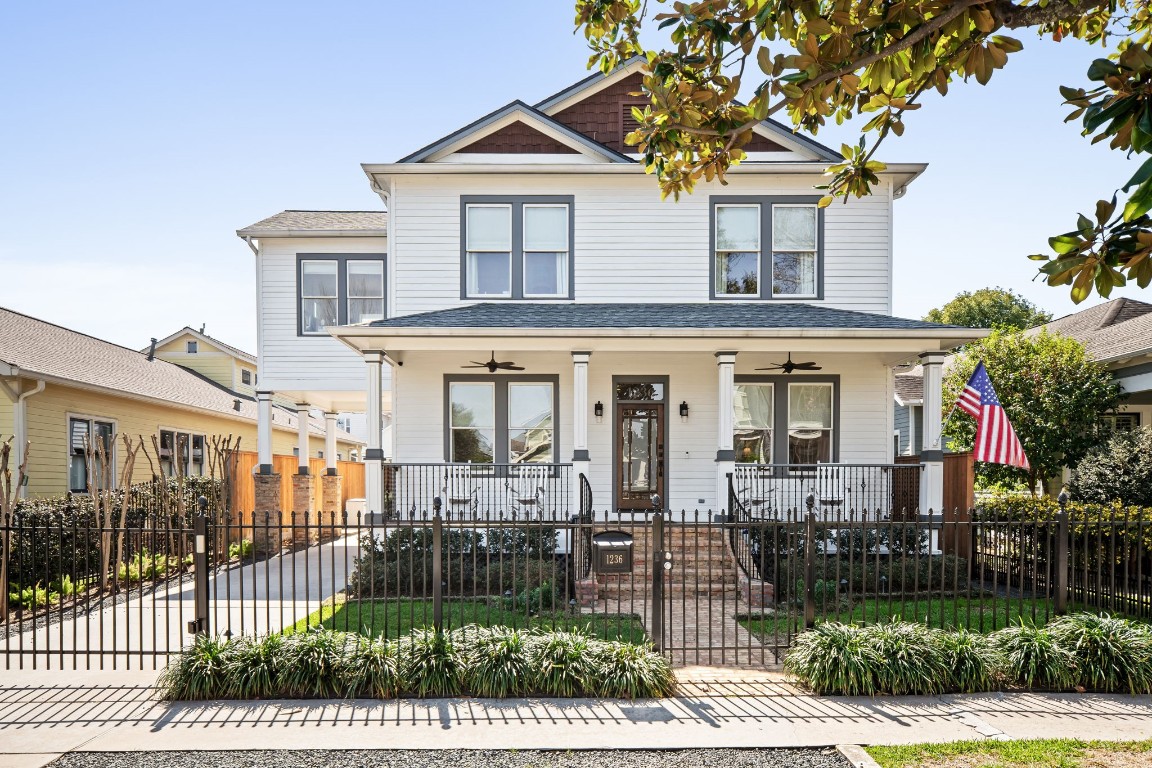 a front view of a house with a porch