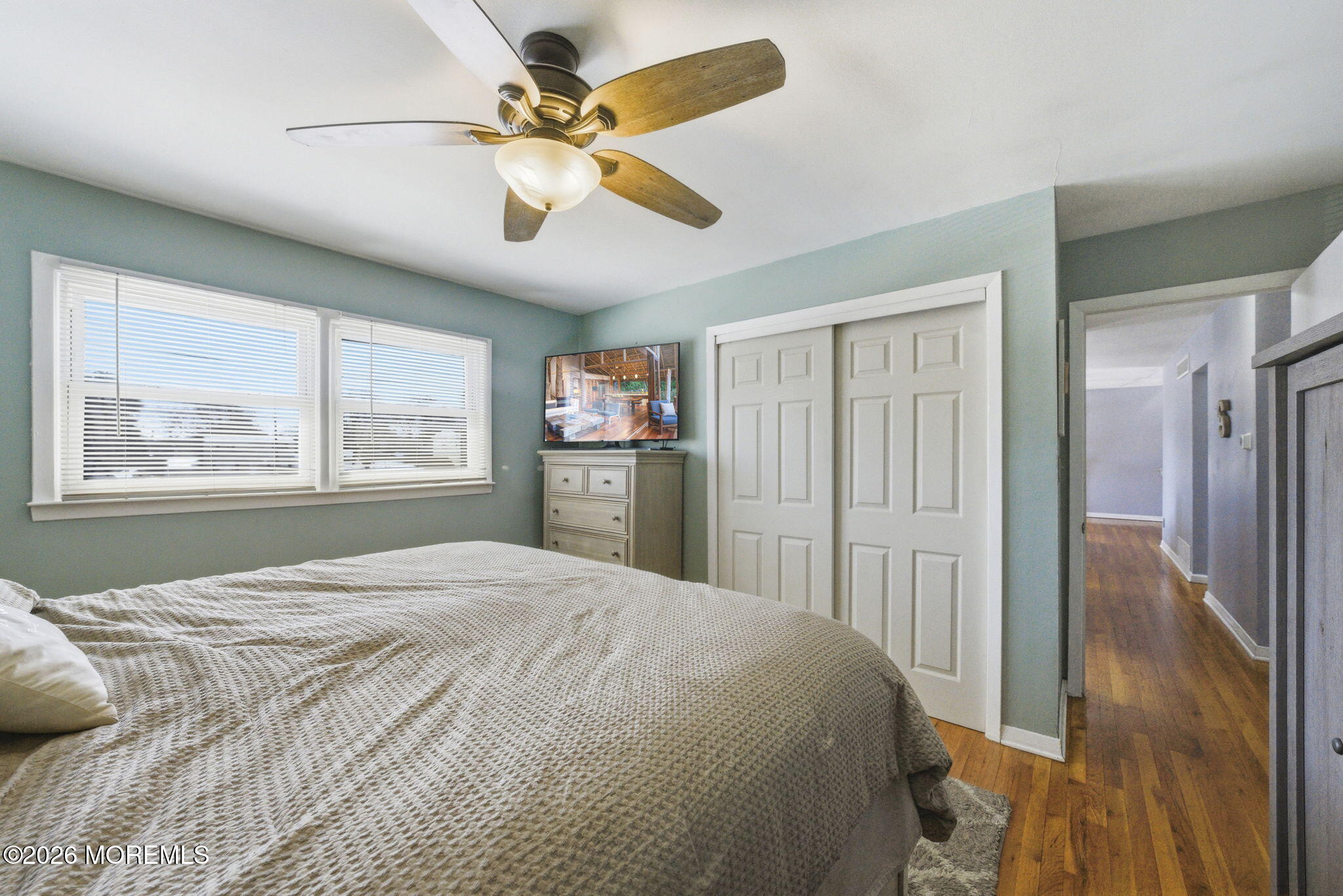 1427 Seminole Road North Brunswick, NJ 08902 - Photo 14 of 45 a bedroom with a large bed and a window