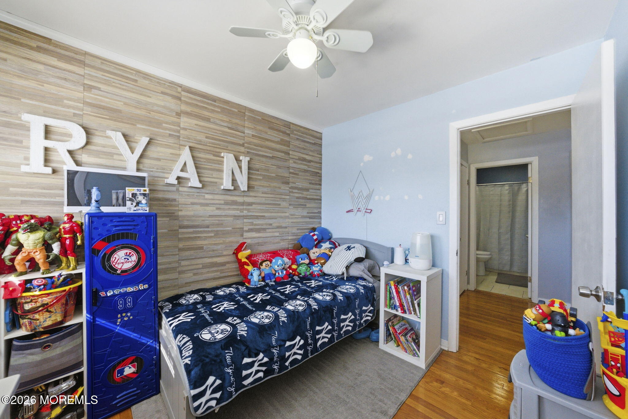 1427 Seminole Road North Brunswick, NJ 08902 - Photo 17 of 45 a bedroom with a bed and a chandelier