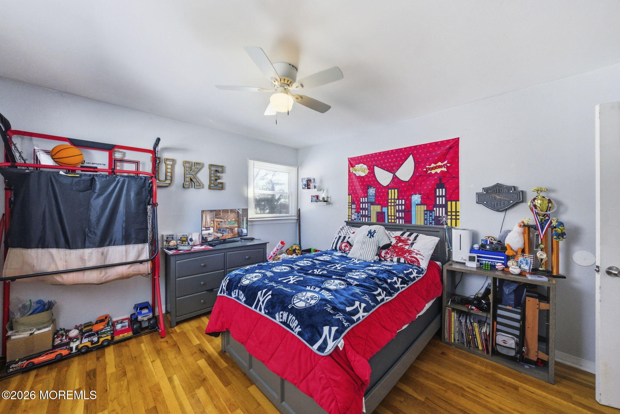 1427 Seminole Road North Brunswick, NJ 08902 - Photo 18 of 45 a bedroom with a bed and a walk in closet