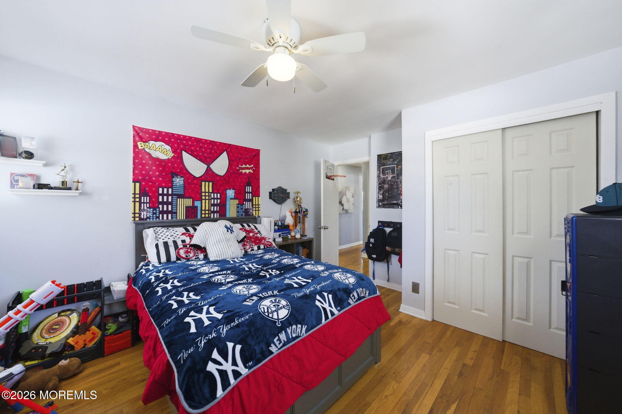 1427 Seminole Road North Brunswick, NJ 08902 - Photo 19 of 45 a bed room with a bed and a walk in closet