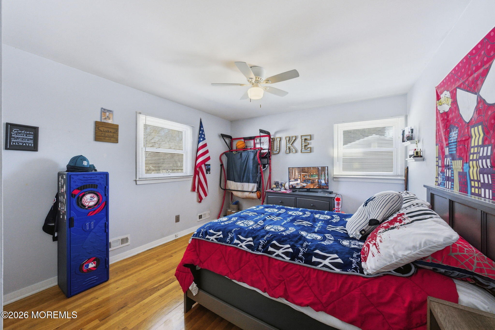 1427 Seminole Road North Brunswick, NJ 08902 - Photo 20 of 45 a bed room with a bed and a couch