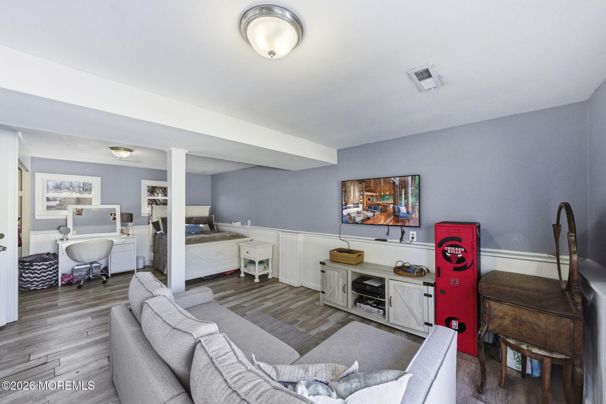 1427 Seminole Road North Brunswick, NJ 08902 - Photo 25 of 45 a living room with furniture and a flat screen tv