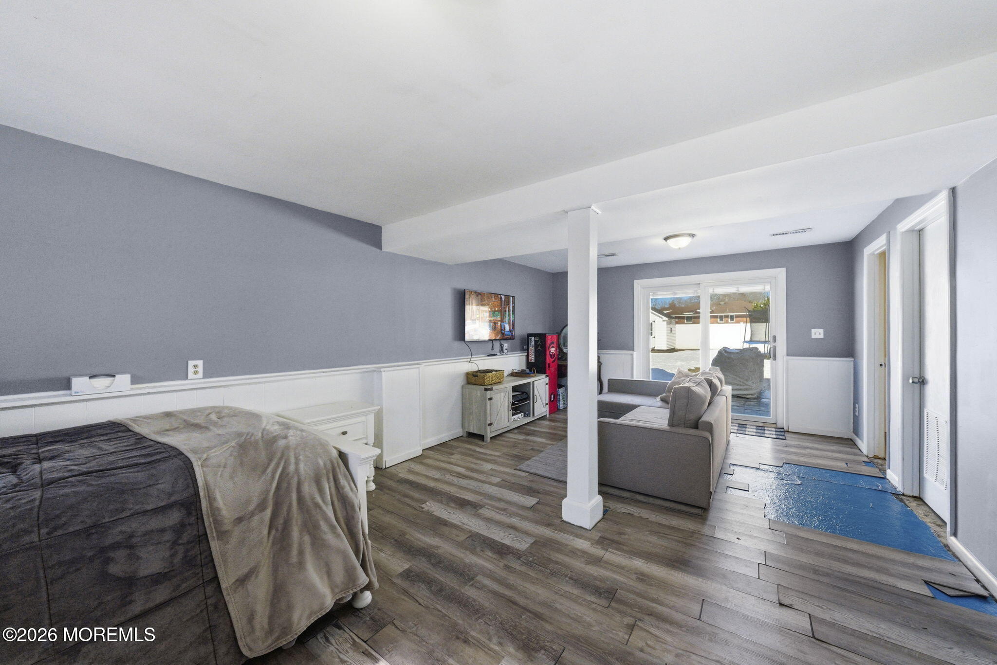 1427 Seminole Road North Brunswick, NJ 08902 - Photo 29 of 45 a spacious bedroom with a bed and wooden floor