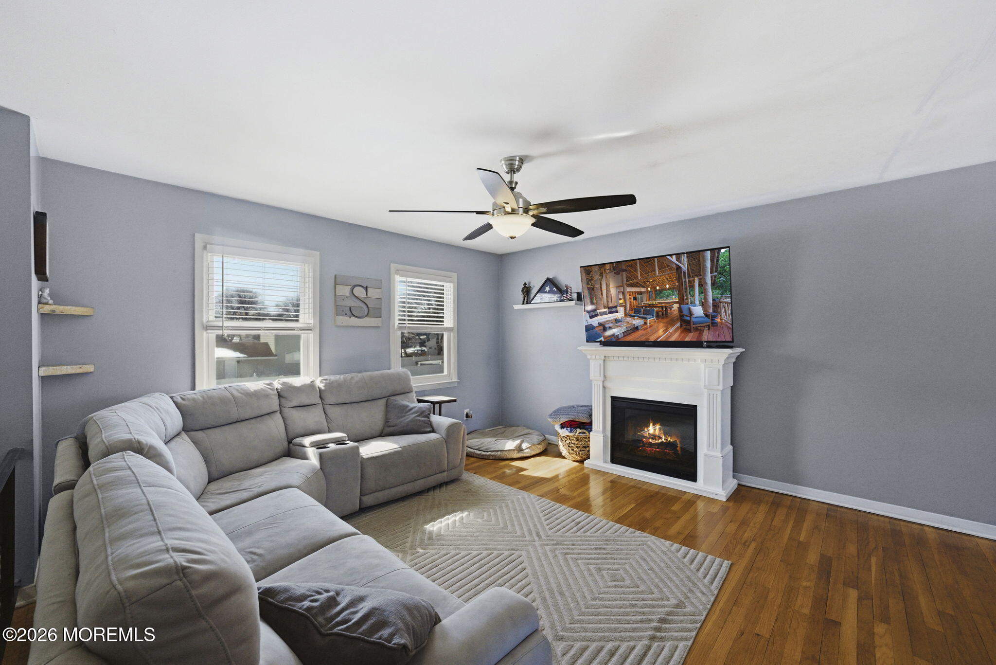 1427 Seminole Road North Brunswick, NJ 08902 - Photo 5 of 45 a living room with furniture and a fireplace