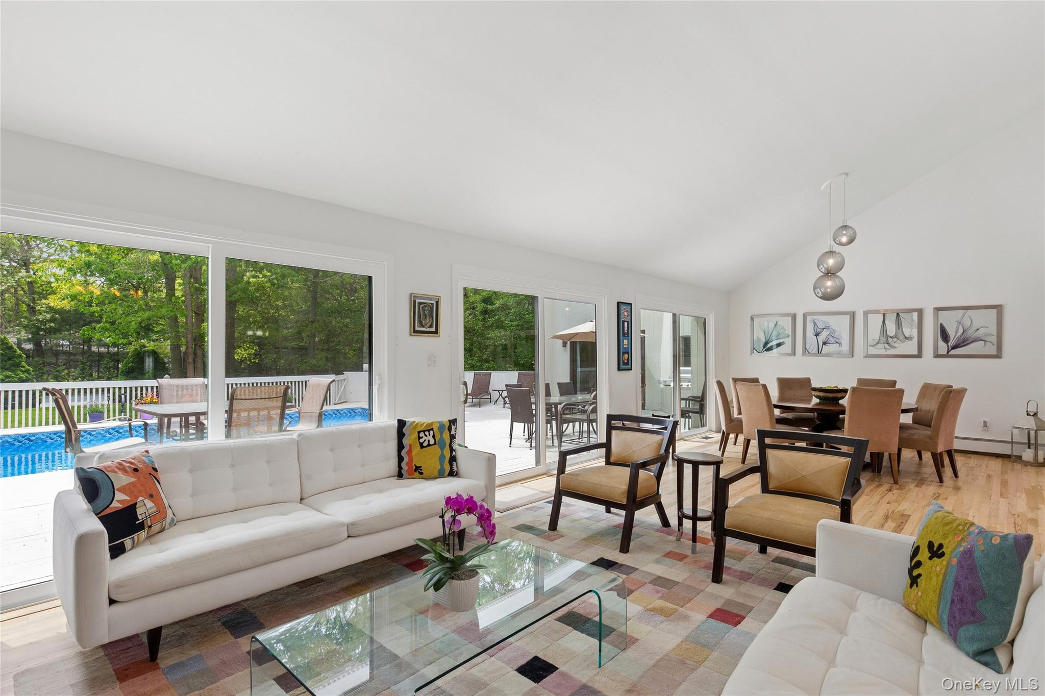 18 Quail Run Hampton Bays, NY 11946 - Photo 16 of 44 a living room with furniture and a large window