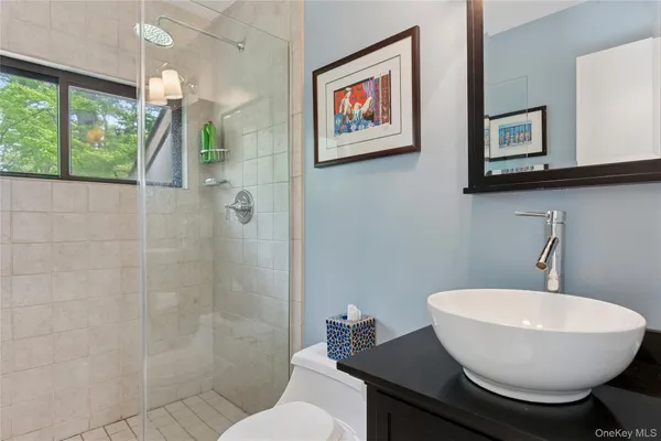 a living room with hard wood floor and a couch