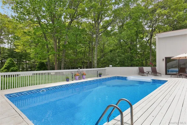 a view of an outdoor space and tennis court