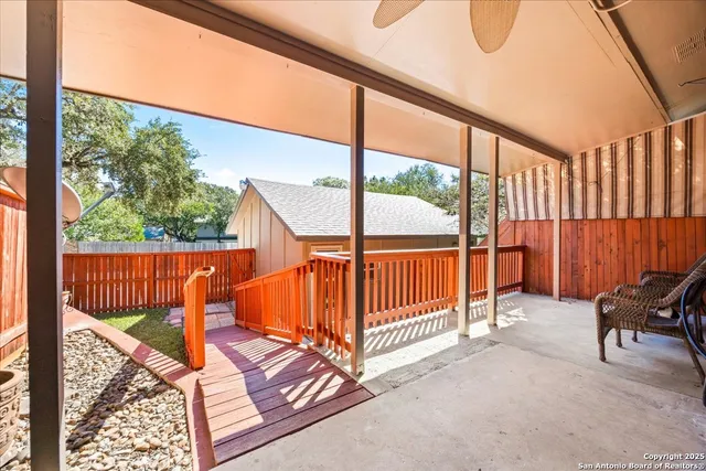 a view of a porch with furniture