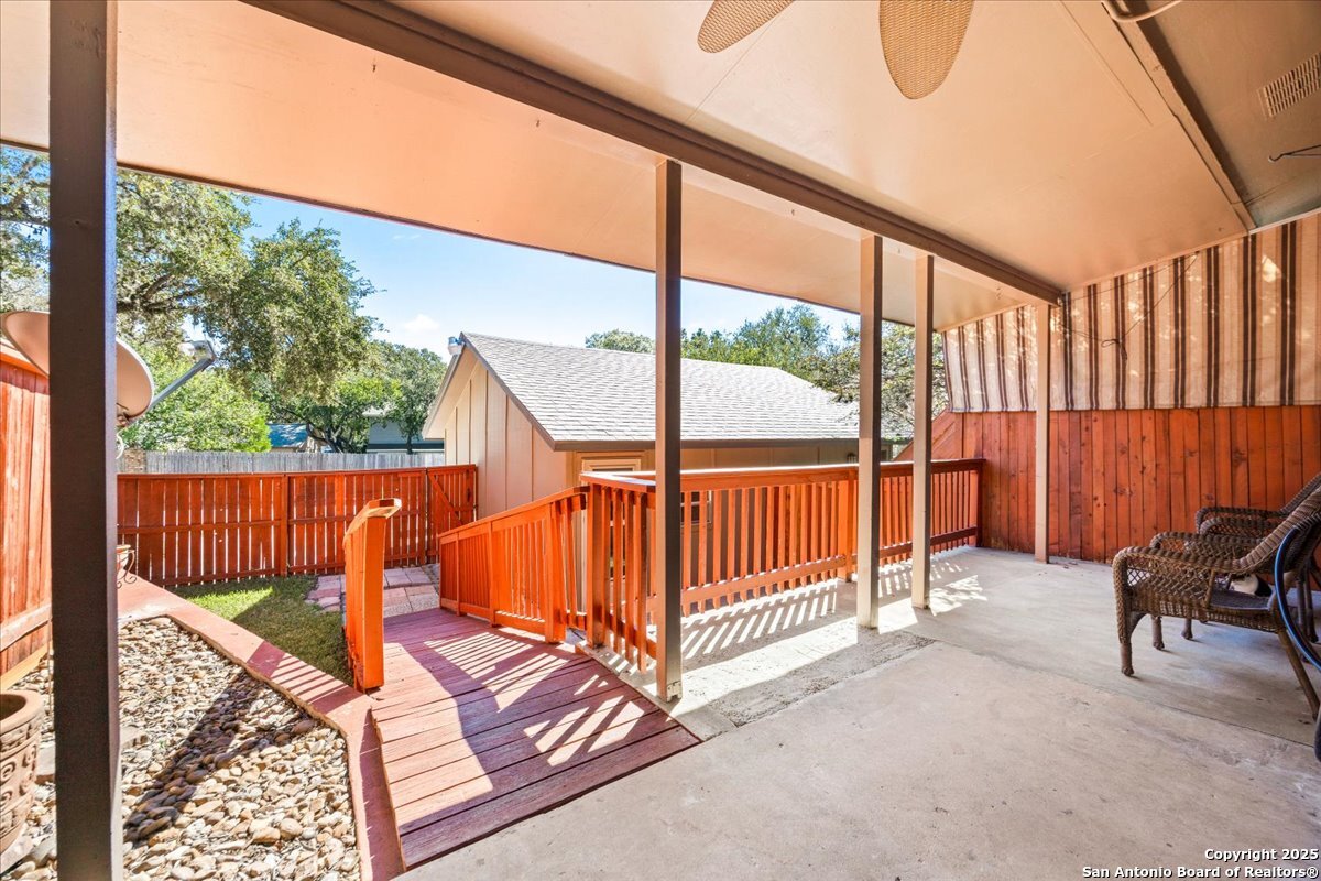 9308 Dover Ridge San Antonio, TX 78250 - Photo 22 of 41 a view of a porch with furniture